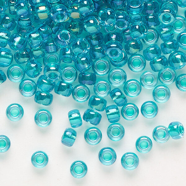 Seed bead, Miyuki, glass, pkg/25g, #6 rocaille, translucent teal-lined luster crystal clear (RR-3742). image number 0