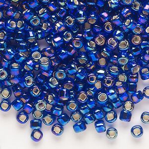 Seed bead, Dyna-Mites™, glass, silver-lined translucent rainbow cobalt, #6 round with square hole. Sold per 40-gram pkg.