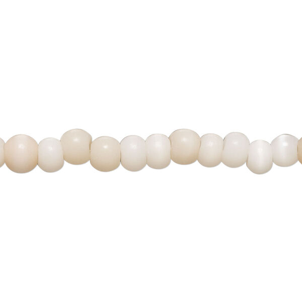 Bead, cat's eye glass (fiber optic glass), soft pink, 5x4mm-6x5mm rondelle and irregular round. Sold per 14-inch strand, approximately 100 beads. image number 0