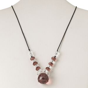 Necklace, silver-finished steel / nylon cord / glass, black / clear / purple, 22x21mm faceted teardrop, 20 inches with 2-inch extender chain and lobster claw clasp. Sold individually.