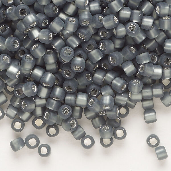 Seed bead, Dyna-Mites™, glass, silver-lined translucent matte gunmetal, #6 round with square hole. Sold per 40-gram pkg. image number 0