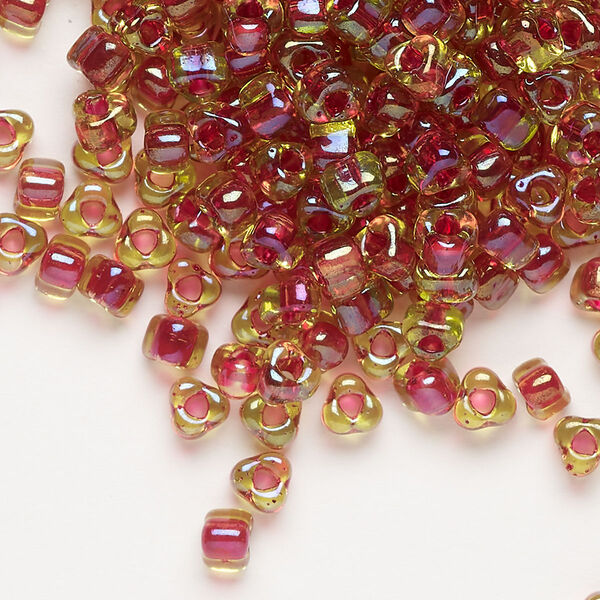 Seed bead, Miyuki, glass, transparent lime color-lined fuchsia, (TR1820), #5 triangle. Sold per 25-gram pkg. image number 0