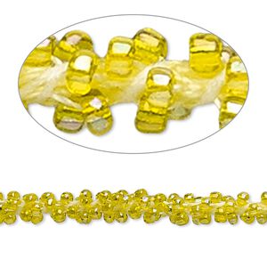 Seed bead cord, glass and nylon, yellow / white / transparent rainbow yellow, 6mm hand-crocheted #11 round. Sold per pkg of 10 feet.