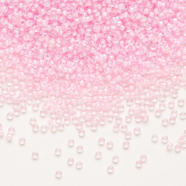 Seed bead, Miyuki, glass, pkg/35g, #15 rocaille, translucent pink-lined luster crystal clear (RR-207). image number 0