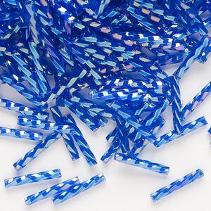 Bugle bead, Dyna-Mites™, glass, translucent rainbow dark blue, 12mm twisted. Sold per 50-gram pkg.