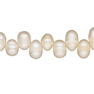 Pearl, cultured freshwater, peach, 8x5mm-9x7mm top-drilled rice, D grade. Sold per 16-inch strand.