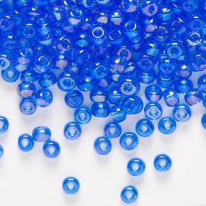Seed bead, Preciosa Ornela Czech glass, pkg/50g, #6 rocaille, translucent rainbow light blue, (31050).