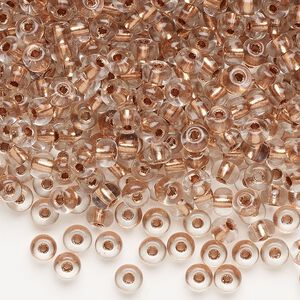 Seed bead, glass, pkg/100g, #6 round, translucent light copper-lined crystal clear.