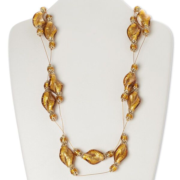 Necklace, lampworked glass with gold-finished brass and steel, dark tan and honey with silver-colored foil, twisted oval, 50-inch continuous loop. Sold individually. image number 0