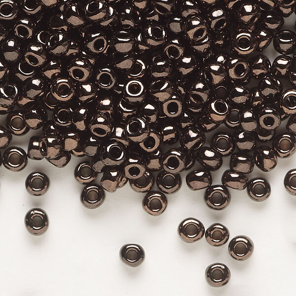 Seed bead, Dyna-Mites™, glass, opaque iris dark bronze, #6 round. Sold per 40-gram pkg. image number 0
