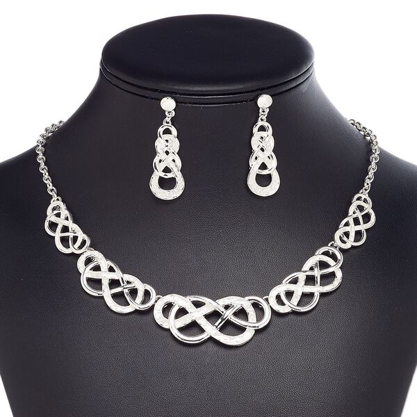 Necklace and earring set, imitation rhodium-plated brass / steel / "pewter" (zinc-based alloy), 29x13mm-40x31mm graduated matte and shiny knot, 18-inch necklace with 2-inch extender chain and lobster claw clasp, 44mm earrings with post. Sold per set. image number 0