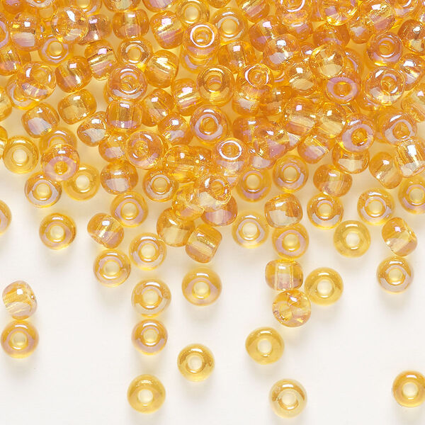 Seed bead, Preciosa Ornela Czech glass, pkg/50g, #6 rocaille, translucent rainbow topaz, (11050). image number 0