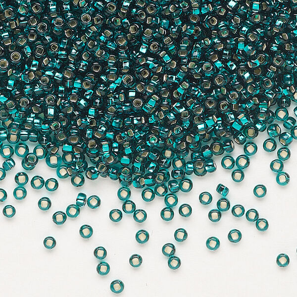 Seed bead, Preciosa Ornela Czech glass, pkg/500g, #11 rocaille, transparent silver-lined teal, (57710). image number 0