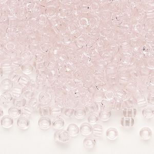 Seed bead, Dyna-Mites™, glass, transparent light pink, #6 round. Sold per 1/2 kilogram pkg.
