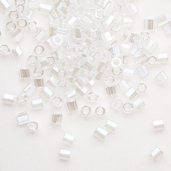 Seed bead, Delica®, glass, pkg/7.5g, #8 cut, translucent luster crystal clear (DBLC-0050). image number 0