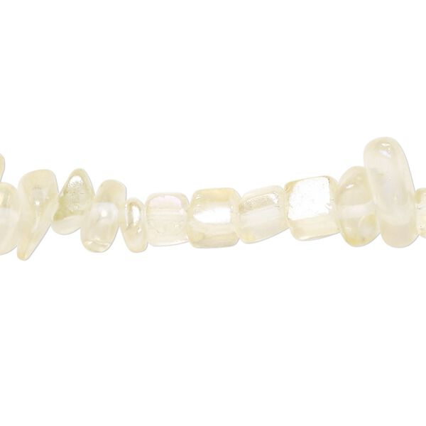 Bead, glass, translucent pale yellow AB, medium chip with 0.6-0.8mm hole. Sold per 32-inch strand, approximately 290-320 beads. image number 0