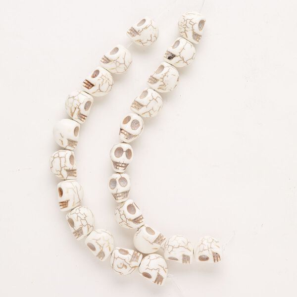 Bead, howlite (natural), 13x12mm-14x13mm skull with matrix, C grade, Mohs hardness 3 to 3-1/2. Sold per 10-inch strand, approximately 20 beads. image number 0