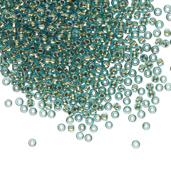 Seed bead, TOHO BEADS®, glass, pkg/7.5g, #11 round, transparent gold-lined aqua (TR-11-284). image number 0