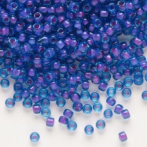 Seed bead, Dyna-Mites™, glass, translucent inside color blue fuchsia, #8 round. Sold per 1/2 kilogram pkg.