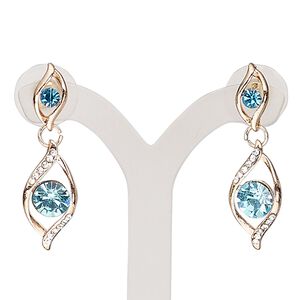 Earring, glass rhinestone / stainless steel / rose gold-finished "pewter" (zinc-based alloy), sapphire blue and clear, 34mm with double twist and post. Sold per pair.