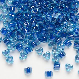 Seed bead, Miyuki, glass, transparent light blue color-lined dark blue, (TR1828), #5 triangle. Sold per 250-gram pkg.