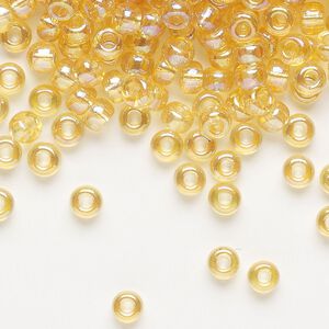 Seed bead, Miyuki, glass, pkg/25g, #6 rocaille, translucent rainbow light topaz (RR-251).