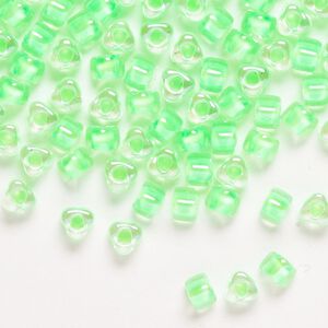 Seed bead, Miyuki, glass, transparent clear color-lined light green, (TR1120), #5 triangle. Sold per 25-gram pkg.