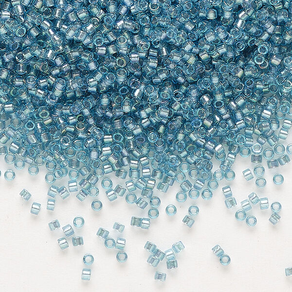 Seed bead, Delica®, glass, pkg/50g, #11 round, translucent dusk-lined luster crystal clear (DB-2383). image number 0