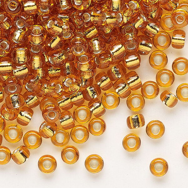 Seed bead, Miyuki, glass, pkg/25g, #6 rocaille, transparent silver-lined marigold (RR-2422). image number 0