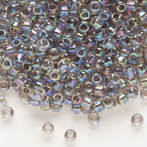 Seed bead, Dyna-Mites™, glass, transparent rainbow inside lilac, #6 round. Sold per 40-gram pkg.