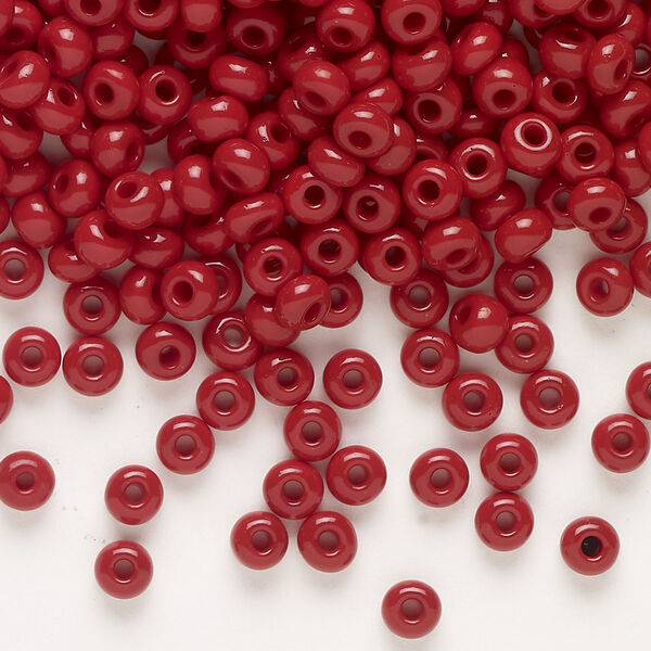 Seed bead, Preciosa Ornela, glass, opaque red coral, #6 rocaille. Sold per 50-gram pkg. image number 0