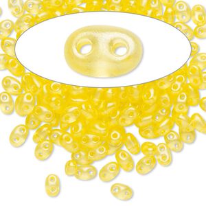 Seed bead, Preciosa Twin™ Czech glass, pkg/10g, 5x2.5mm oval, translucent yellow terra pearl clear, (08386).