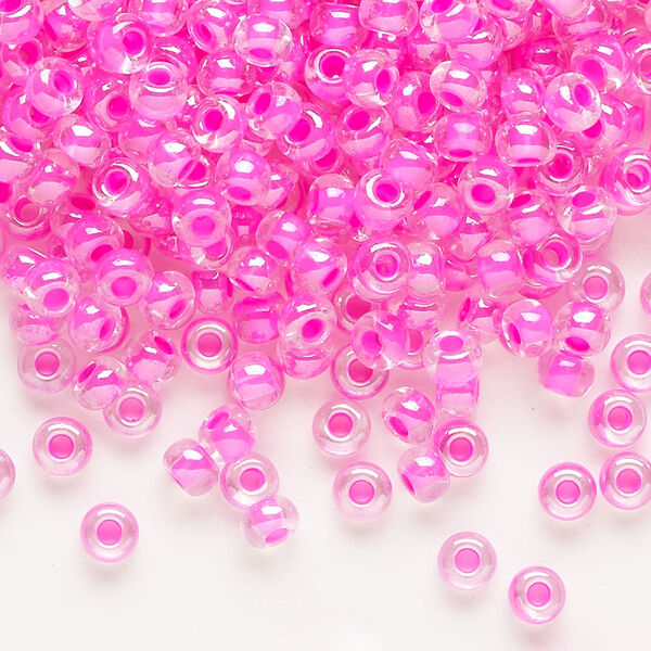 Seed bead, Preciosa Ornela Czech glass, pkg/50g, #6 rocaille, translucent pink-lined luster clear, (38177). image number 0