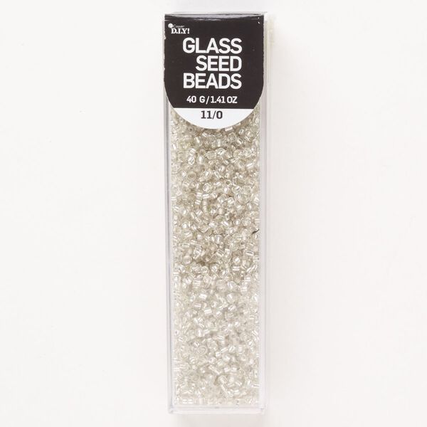 Seed bead, glass, pkg/40g, #11 round, translucent silver-lined clear. image number 0