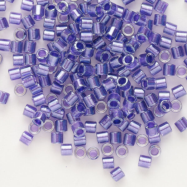 Seed bead, Delica®, glass, pkg/7.5g, #8 round, translucent purple-lined luster crystal clear (DBL-0906). image number 0