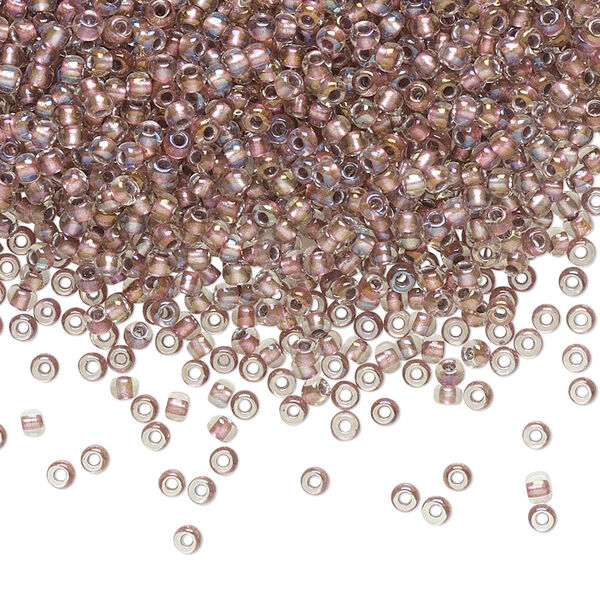 Seed bead, TOHO BEADS®, glass, pkg/250g, #11 round, translucent rose gold-lined crystal clear (TR-11-267). image number 0