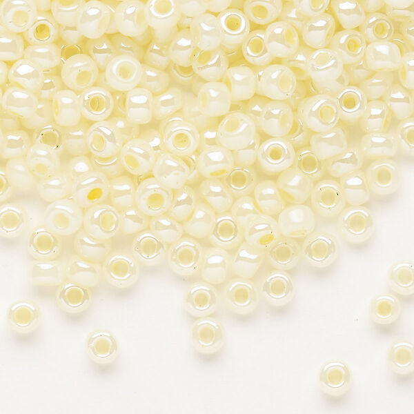 Seed bead, Dyna-Mites™, glass, opaque ceylon pastel cream, #6 round. Sold per 40-gram pkg. image number 0
