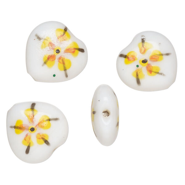 Bead, lampworked glass, opaque white / black / yellow, 17-16mm puffed heart with double-sided painted flower design. Sold per pkg of 4. image number 0