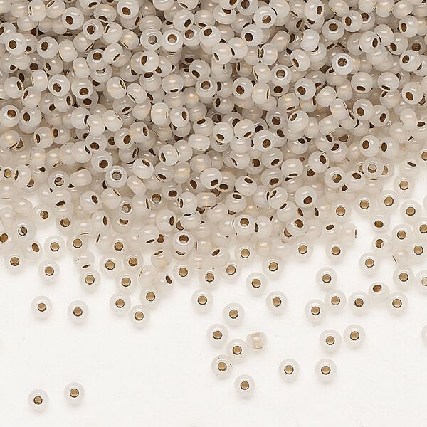 Seed bead, Preciosa Ornela Czech glass, pkg/50g, #11 rocaille, transparent metallic bronze-lined clear, (68106). image number 0