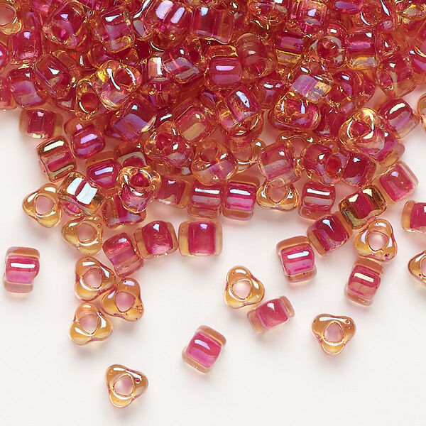 Seed bead, Miyuki, glass, transparent amber yellow color-lined fuchsia, (TR1163), #5 triangle. Sold per 250-gram pkg. image number 0