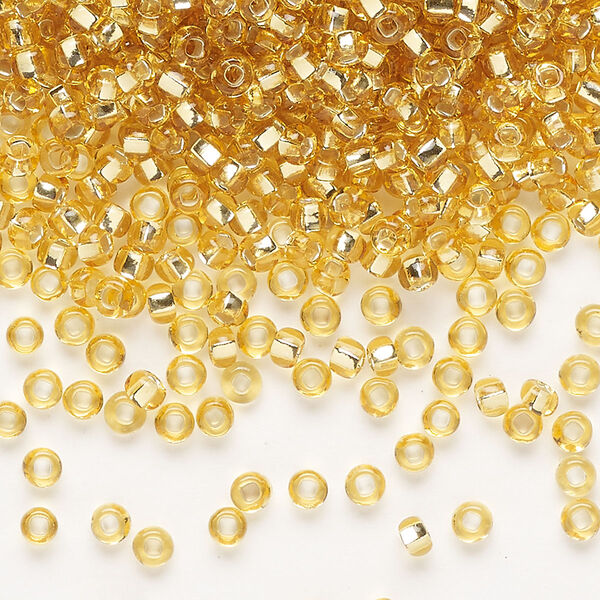 Seed bead, Preciosa Ornela Czech glass, pkg/500g, #8 rocaille, transparent silver-lined light topaz, (17020). image number 0