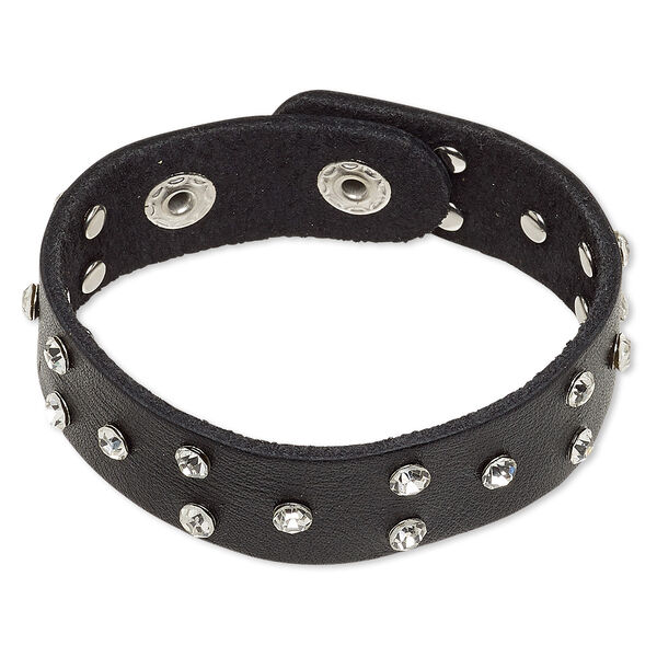 Bracelet, leather (dyed) / glass rhinestone / imitation rhodium-finished steel, black and clear, 22mm wide with rivets, adjustable at 6 and 7 inches with double snap closure. Sold individually. image number 0