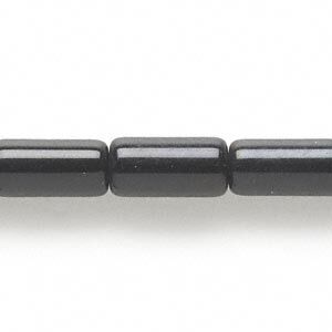 Bead, glass, opaque black, 15x8mm-16x9mm round tube. Sold per 15-inch strand.