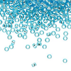 Seed bead, TOHO BEADS®, glass, pkg/50g, #8 round, transparent silver-lined aquamarine (TR-08-23).