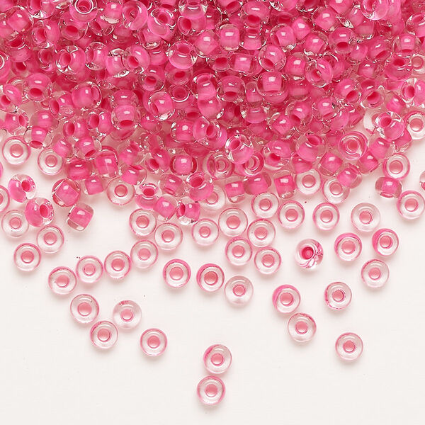 Seed bead, Preciosa Ornela Czech glass, pkg/50g, #8 rocaille, transparent terra intensive pink-lined clear, (08A77). image number 0