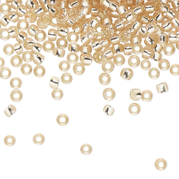 Seed bead, TOHO BEADS®, glass, pkg/250g, #8 round, transparent silver-lined rosaline (TR-08-31). image number 0