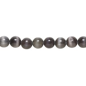 Bead, cat's eye glass (fiber optic glass), opaque black, 6mm round, quality grade. Sold per 15-1/2" to 16" strand.