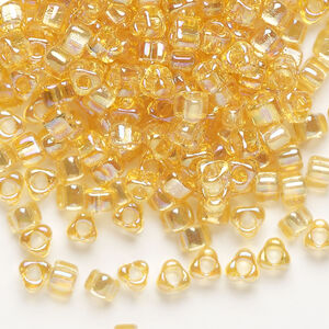 Seed bead, Miyuki 1pkg10g, glass, #5 triangle, translucent rainbow light topaz (TR-1152)