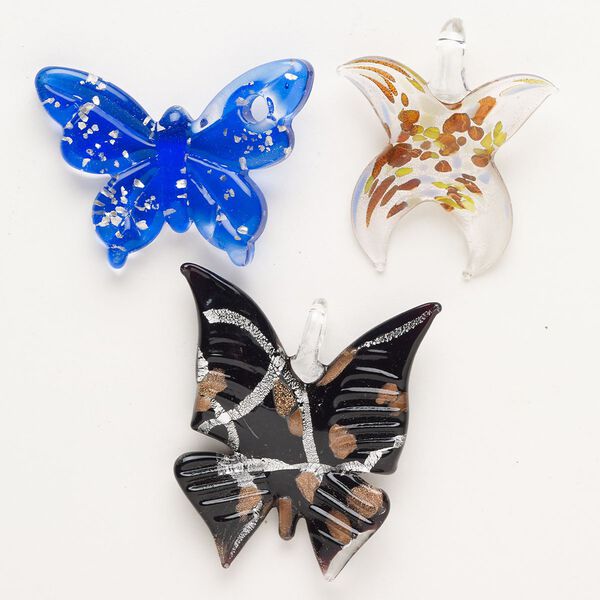 Random focal mix, lampworked glass, opaque and translucent mixed colors with silver-colored foil and copper-colored glitter, 37x25mm-56x48mm butterfly. Sold per pkg of 3. image number 0