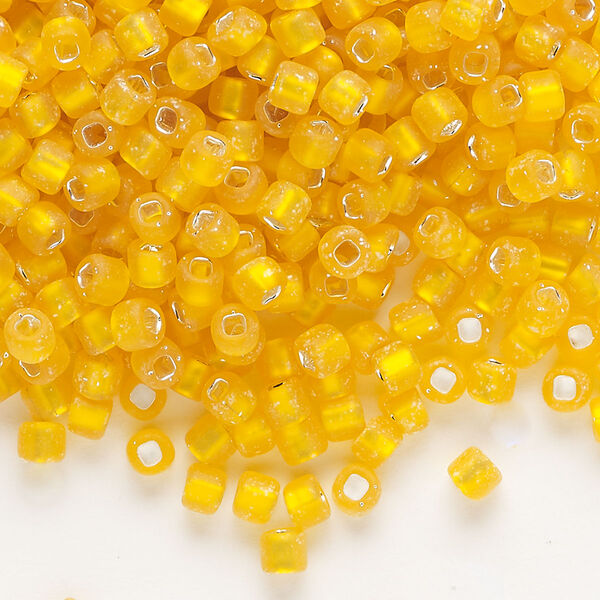 Seed bead, Dyna-Mites™, glass, silver-lined translucent matte orange, #6 round with square hole. Sold per 1/2 kilogram pkg. image number 0